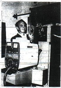 Bill Ramsey with new theater projector Photo courtesy Golden Transcript, 1972